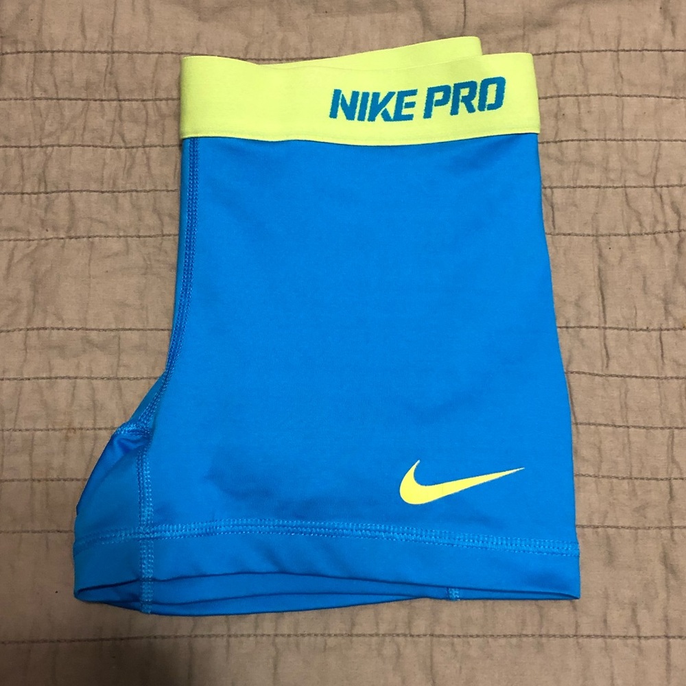 Neon blue Nike Pro shorts